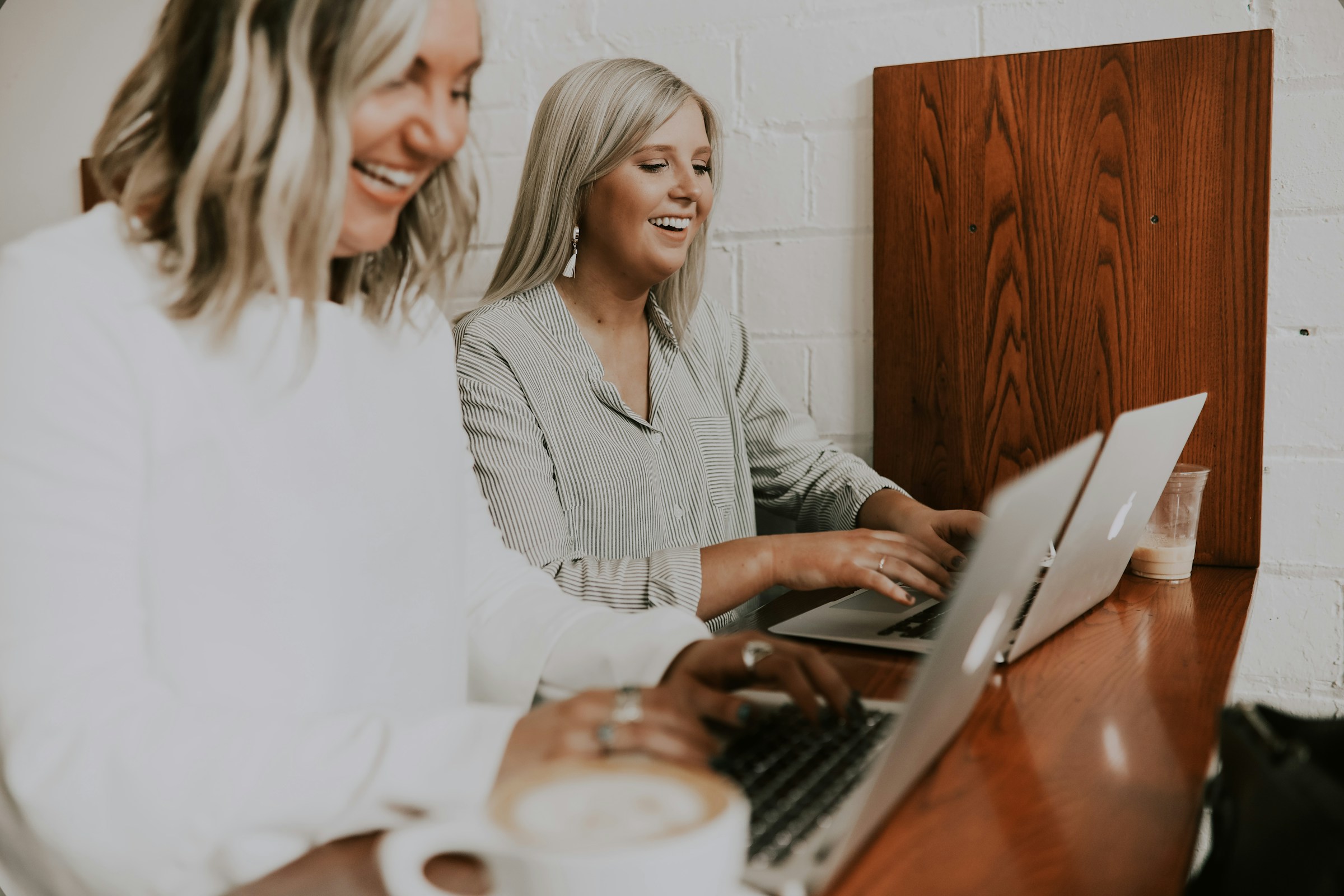 women laughing - Global Payroll Services