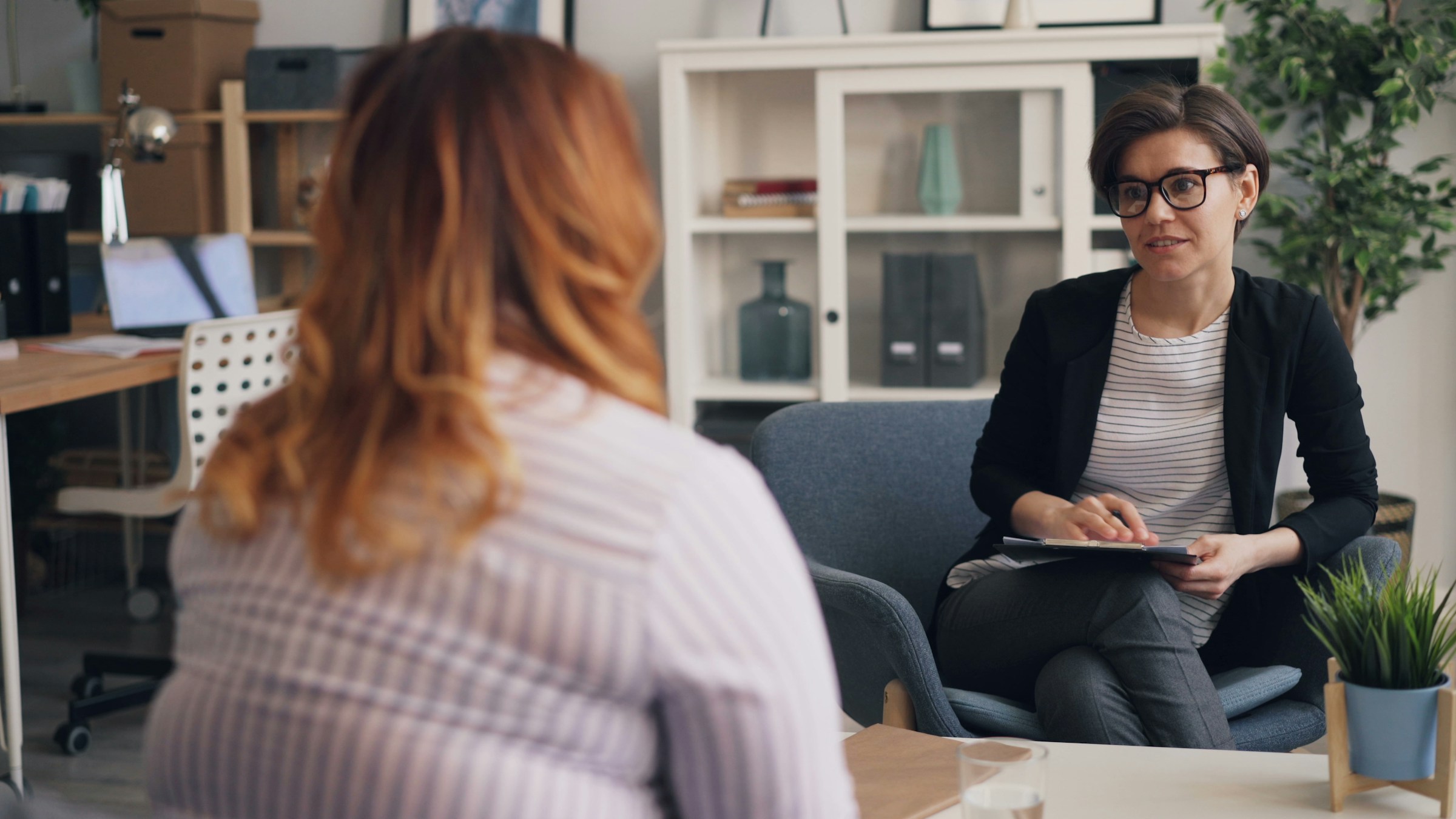 woman interviewing - How To Hire International Employees