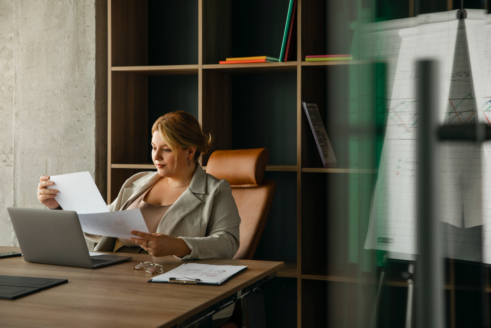 woman in an office - Outsourced Payroll Services