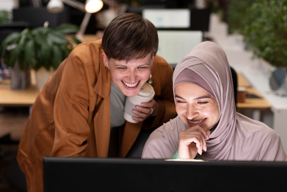 women smiling - Nitaqat Calculator