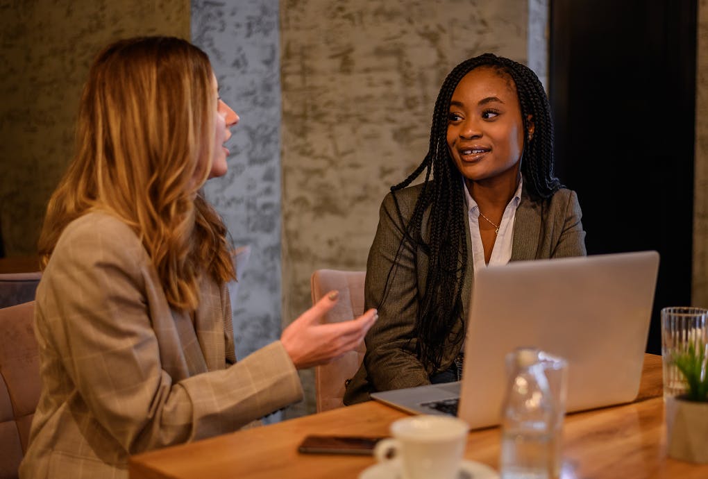 women talking - Global Talent Acquisition