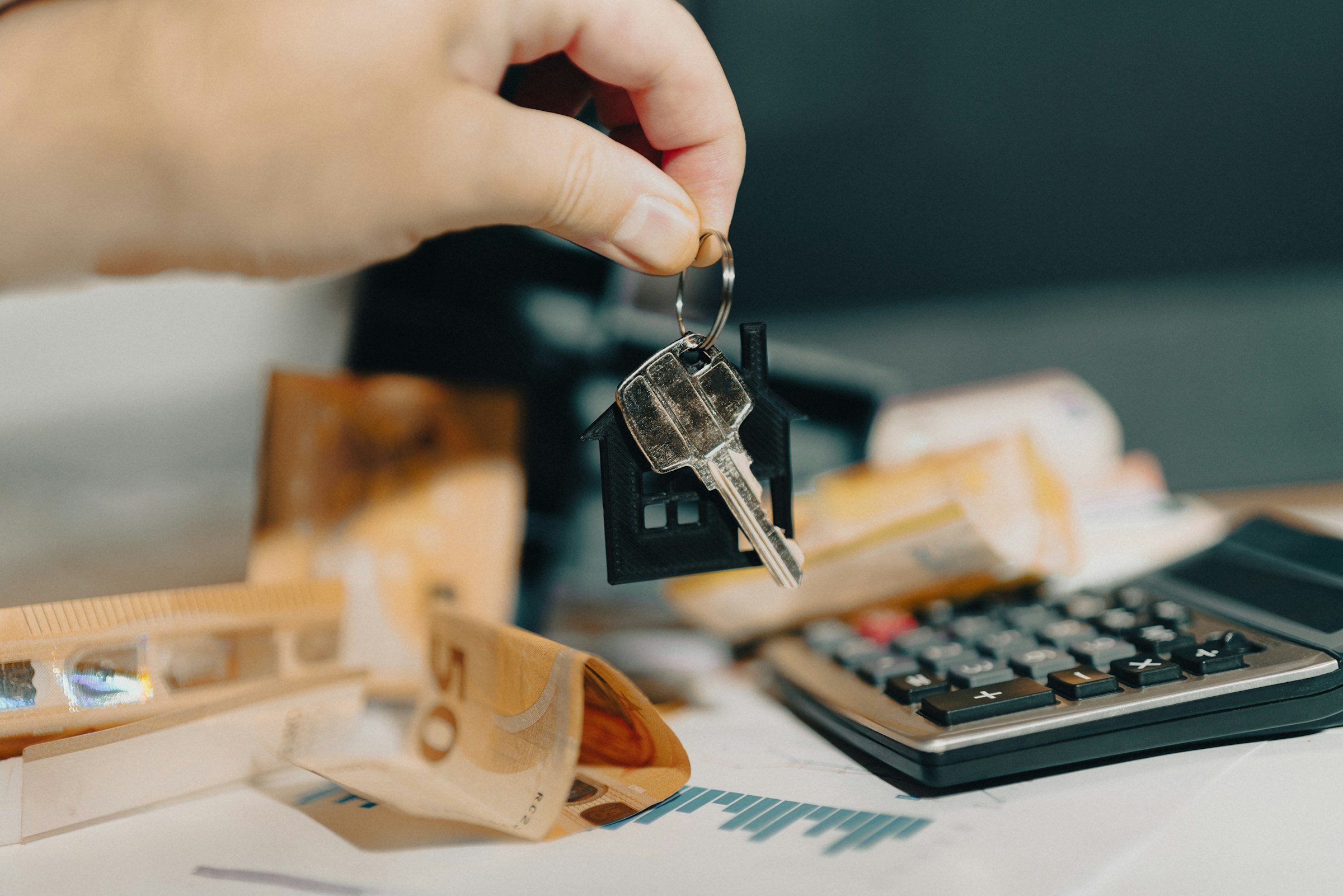 Person Holding Keys - Can Foreigners Buy Property in the UAE