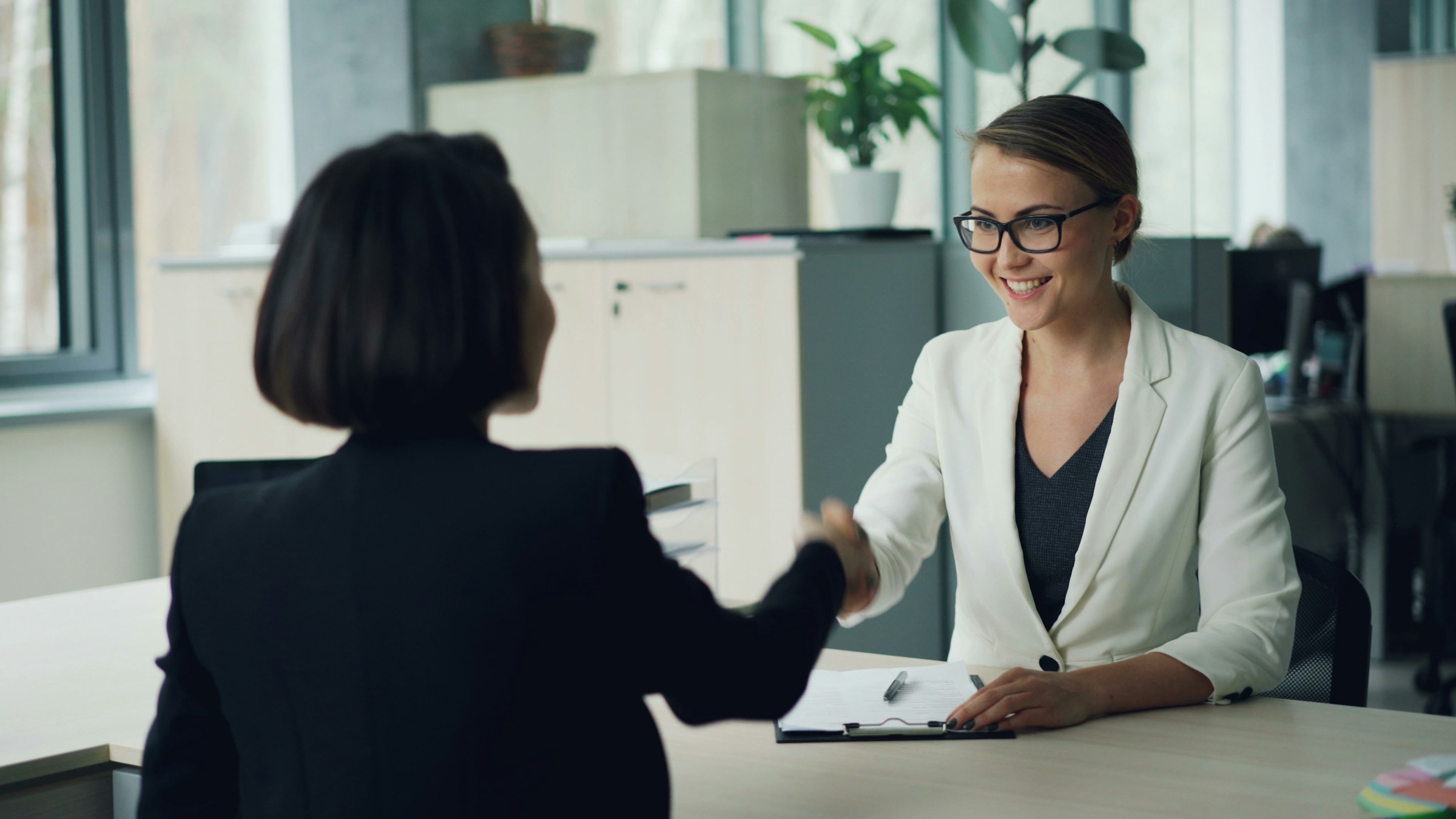 People Shaking Hands - Can Foreigners Buy Property in the UAE
