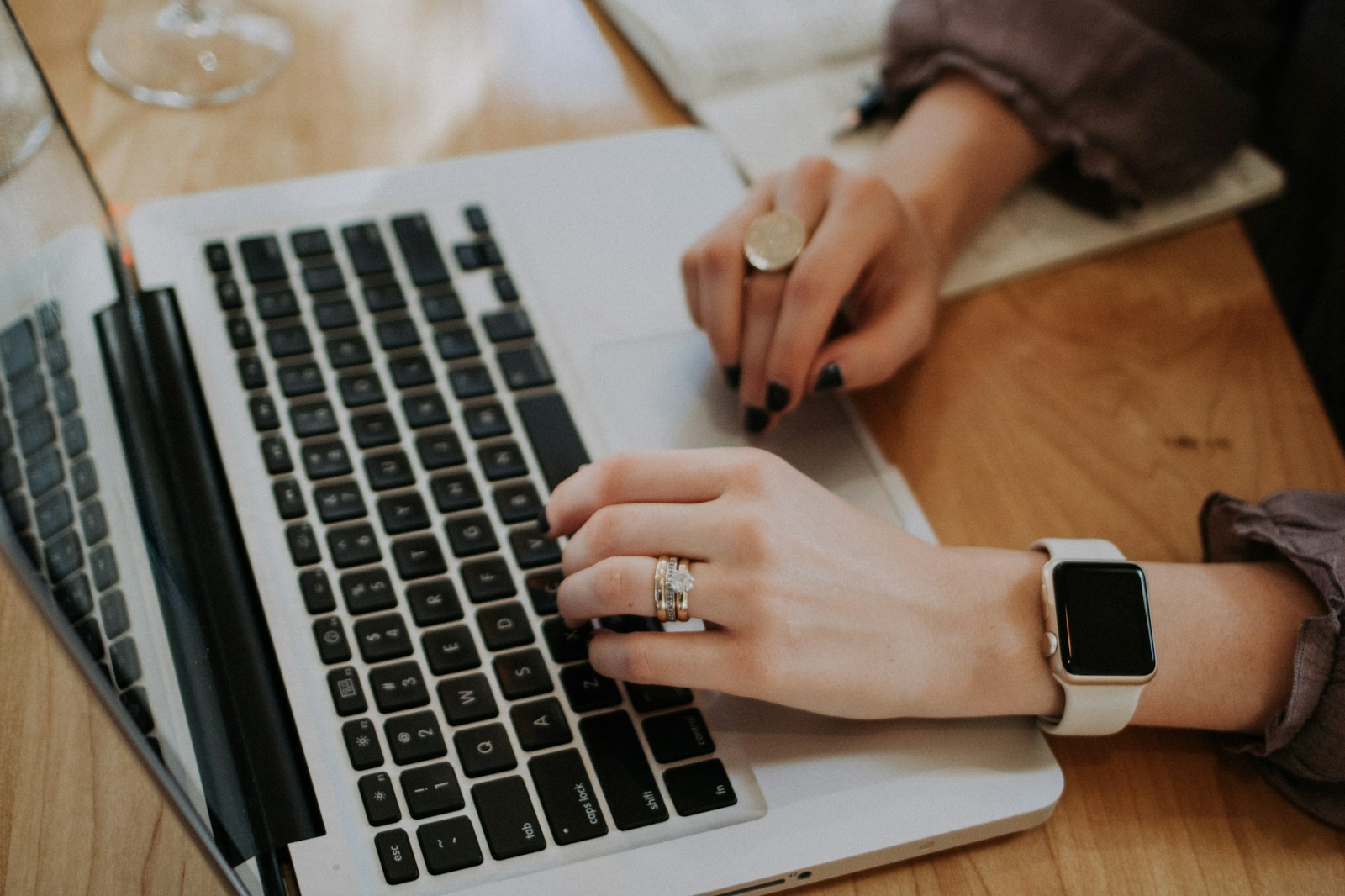 Woman Using Laptop - Documents Required to Open Company Bank Account in UAE