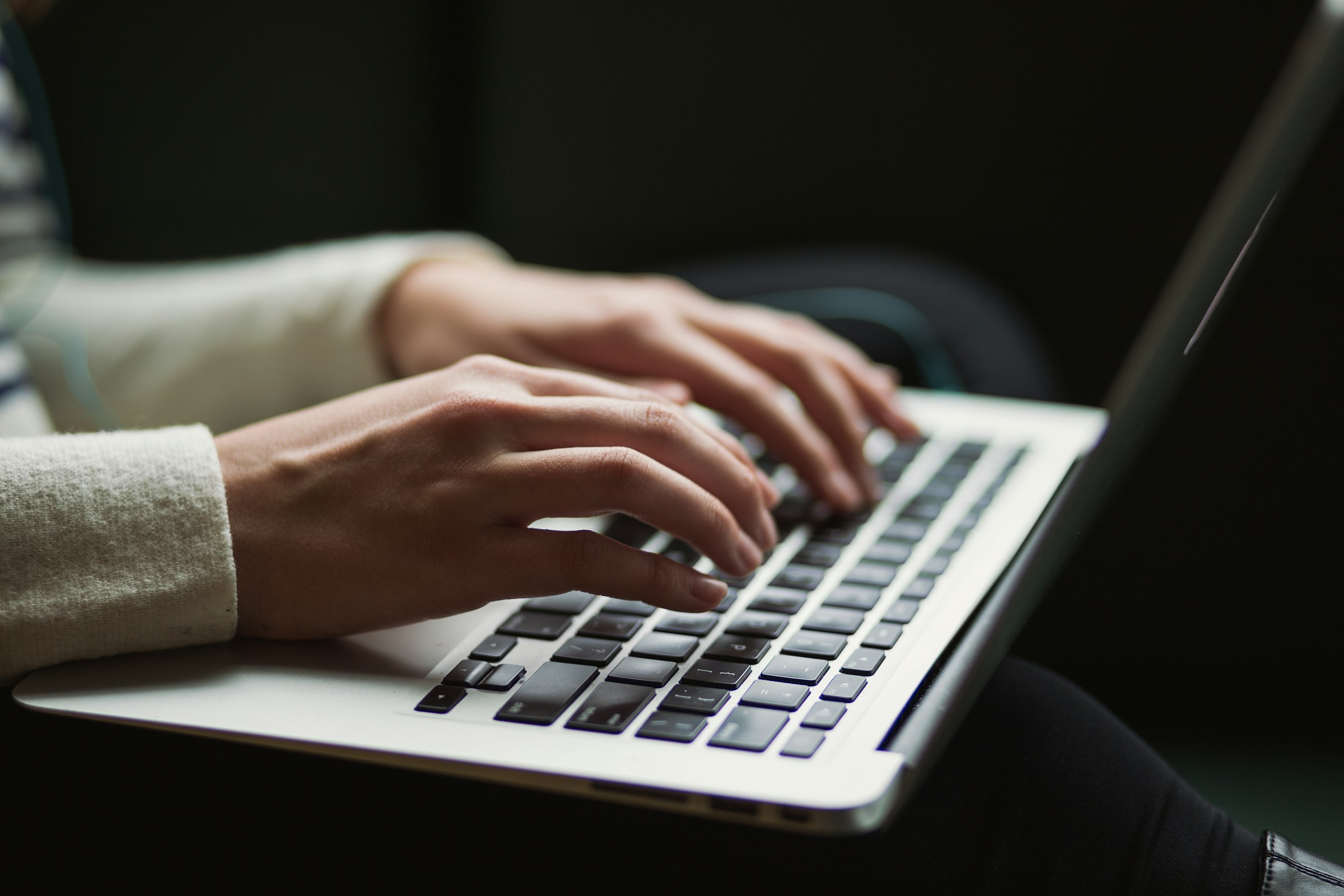 Person Using Laptop - End of Service Benefits in Saudi Labour Law