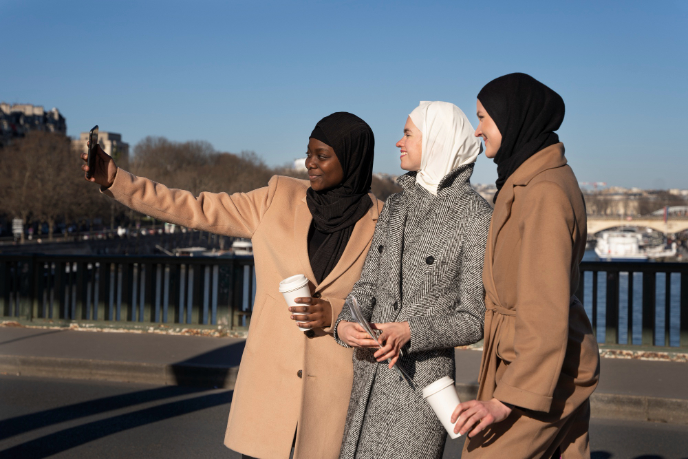 women taking a selfie - Public Holidays in UAE